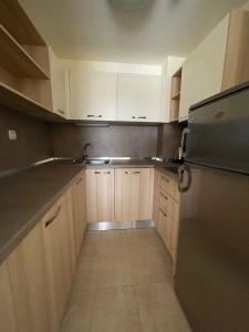 A kitchen or kitchenette at Apartments in Peter House