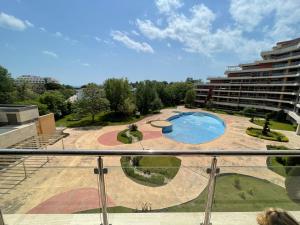 a view of a swimming pool from a balcony at Apartments in Peter House in Sunny Beach