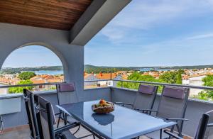 En balkon eller terrasse på Apartment Lorencin Milka