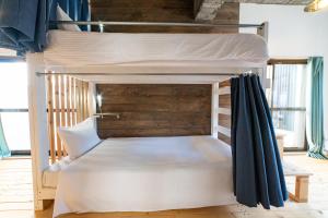 Letto o letti in una camera di Ichi The Hostel