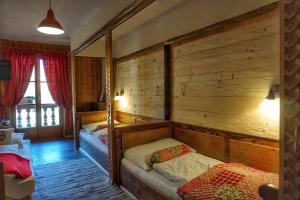 Postel nebo postele na pokoji v ubytování Hotel Schlosswirt