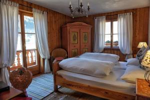 Postel nebo postele na pokoji v ubytování Hotel Schlosswirt