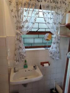 Et badeværelse på Garden cottage