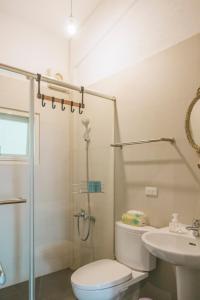 Koupelna v ubytování Wind Wave Ocean Homestay + 35 fotografií