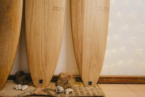 Postel nebo postele na pokoji v ubytování Wind Wave Ocean Homestay