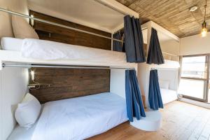Letto o letti in una camera di Ichi The Hostel