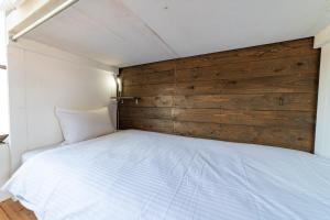 Letto o letti in una camera di Ichi The Hostel
