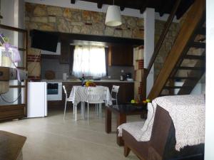 Kuchyň nebo kuchyňský kout v ubytování Pavloudis Apartments