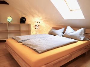 Postel nebo postele na pokoji v ubytování Ferienwohnungen Prihoda