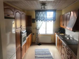 Kuchyň nebo kuchyňský kout v ubytování Villa Verdi