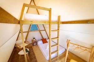 A bed or beds in a room at Kampaoh El Palmar