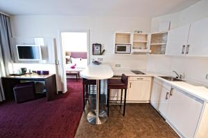 Kuchyňa alebo kuchynka v ubytovaní Hotel Jungstil
