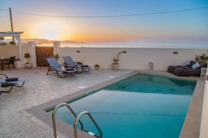 a swimming pool with a view of the ocean at Kondarini Villa - Stunning Sea Views, 290m from the beach, by ZanteWize in Tsilivi