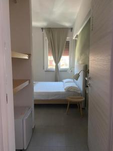 Postel nebo postele na pokoji v ubytování B&B Barù