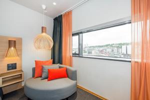 Postel nebo postele na pokoji v ubytování Clarion Hotel The Edge