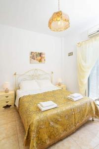 Postel nebo postele na pokoji v ubytování Rosa 's house + 30 fotografií
