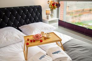 Posteľ alebo postele v izbe v ubytovaní Maya's Flats & Resorts 55 - GRANO RESIDENCE Pszenna 5