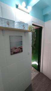 A kitchen or kitchenette at Pensión Playa