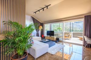 Posezení v ubytování Morina Deluxe Hotel