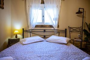 A bed or beds in a room at Selana House with outdoor pool