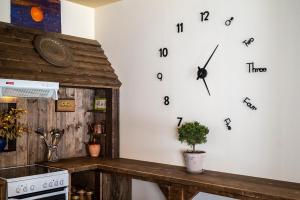 A kitchen or kitchenette at Selana House with outdoor pool
