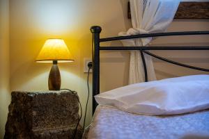 A bed or beds in a room at Selana House with outdoor pool