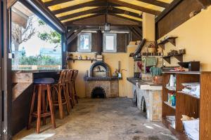 A kitchen or kitchenette at Selana House with outdoor pool