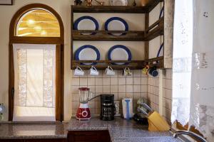 A kitchen or kitchenette at Selana House with outdoor pool