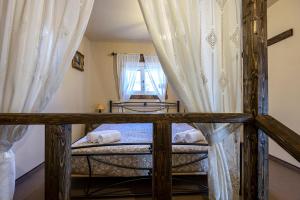 A bed or beds in a room at Selana House with outdoor pool