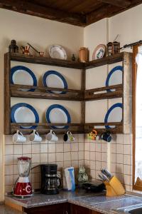 A kitchen or kitchenette at Selana House with outdoor pool