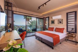 Postel nebo postele na pokoji v ubytování Morina Deluxe Hotel + 37 fotografií