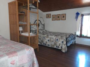 Posteľ alebo postele v izbe v ubytovaní Appartamento “Il Borgo”