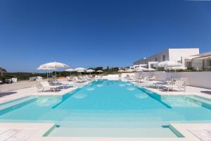 The swimming pool at or close to Capo Falcone Charming Apartments