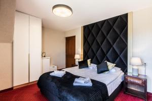 Posteľ alebo postele v izbe v ubytovaní Dworek pod Giewontem - Jacuzzi & Sauna