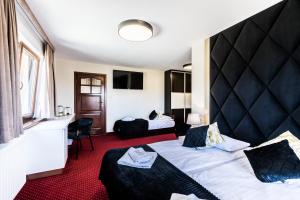 Posteľ alebo postele v izbe v ubytovaní Dworek pod Giewontem - Jacuzzi & Sauna