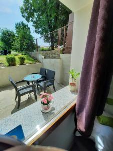 a view of a balcony with a table and chairs at Apartment Klementina FREE PARKING in Zagreb