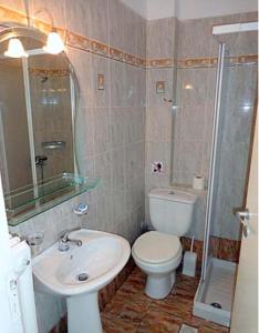 Koupelna v ubytování AKTI ROOMS