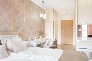 Łóżko lub łóżka w pokoju w obiekcie apart76 Gdańsk Bastion Wałowa