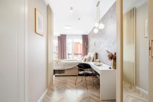 Łóżko lub łóżka w pokoju w obiekcie apart76 Gdańsk Bastion Wałowa