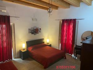 Voodi või voodid majutusasutuse Decadracma rooms toas