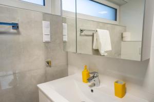 Vannituba majutusasutuses Izi Apartman