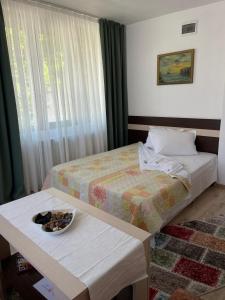 Krevet ili kreveti u jedinici u okviru objekta Guest House Liliya