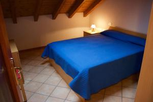 Posteľ alebo postele v izbe v ubytovaní Villa Rosina Loft