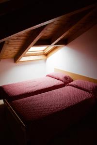 Posteľ alebo postele v izbe v ubytovaní Villa Rosina Loft