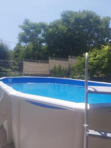a swimming pool with a fence around it at Maison de 4 chambres avec piscine privee et jardin clos a Aubenas a 1 km de la plage in Aubenas