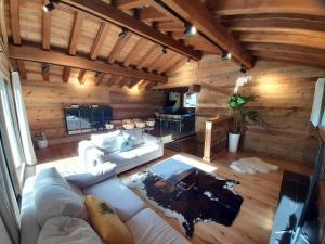 an overhead view of a living room with wooden walls at Amazing chalet in Chamonix-Mont-Blanc