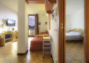 A bed or beds in a room at Borgo Stalle Residence