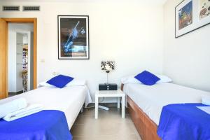 Homeincalpe Borumbot客房内的一张或多张床位