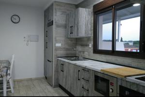 Kuchyň nebo kuchyňský kout v ubytování Villa la Parra + 6 fotografií