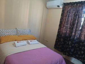 Katil atau katil-katil dalam bilik di Home Away From Home @ the Heart of Batangas City